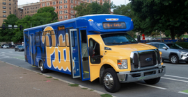 Blue and gold bus. 